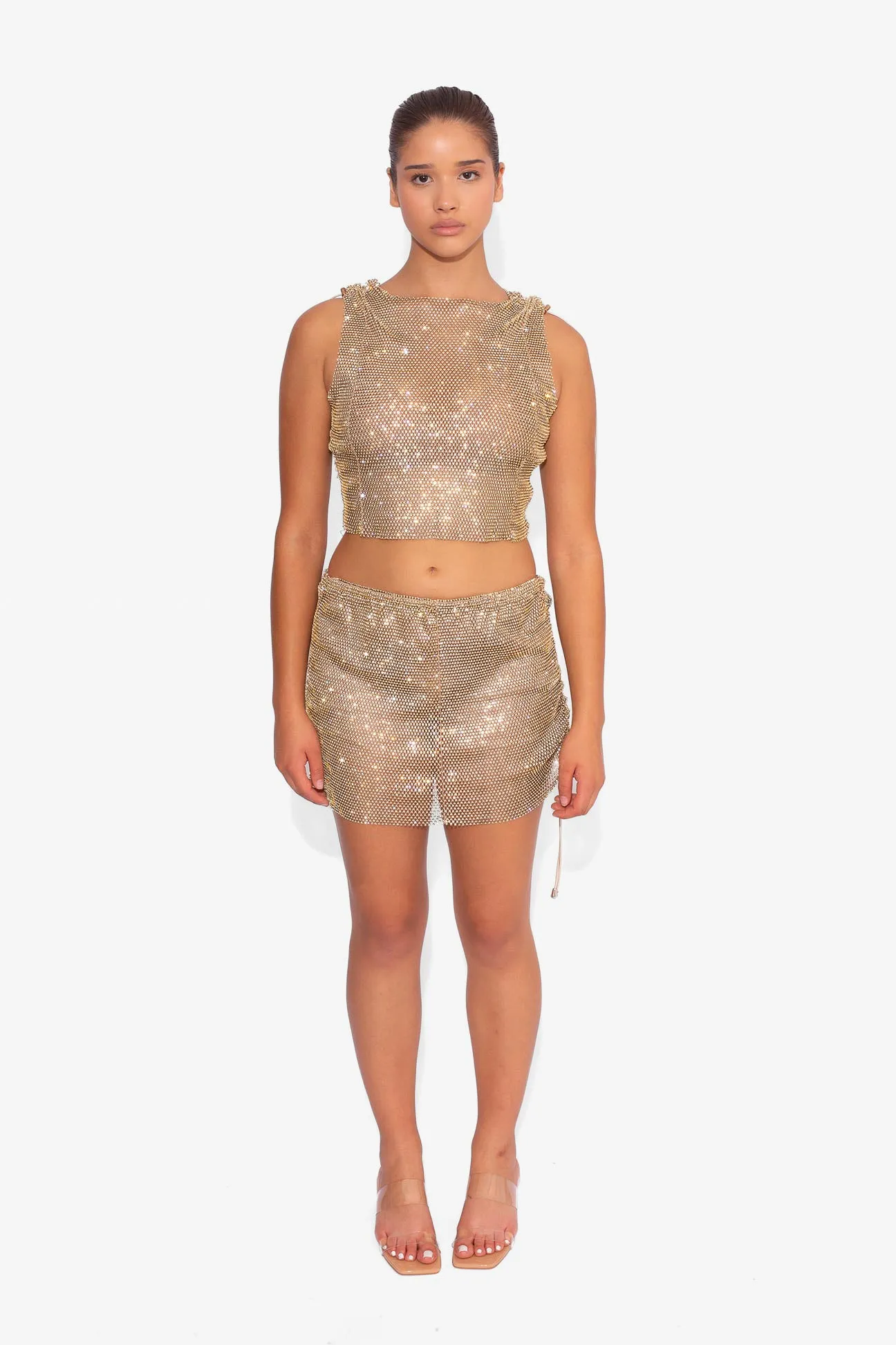 Crystal Embellished Fishnet Mini Skirt in Gold